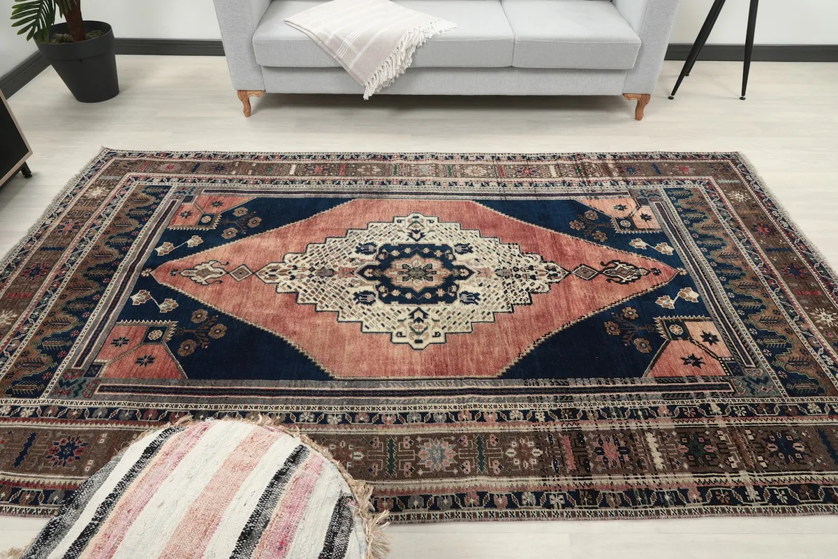 Frontal room view of the rug, emphasizing its presence and color scheme in the space