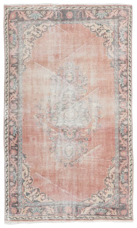 Full top view of the 4'0" x 6'11" rose medallion vintage Anatolian area rug.