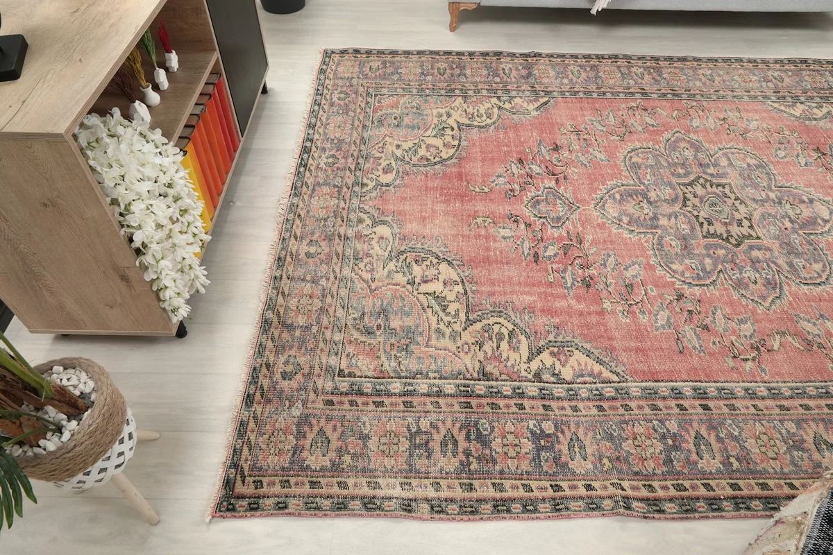 Rug in a room setting from an alternate angle, highlighting its size