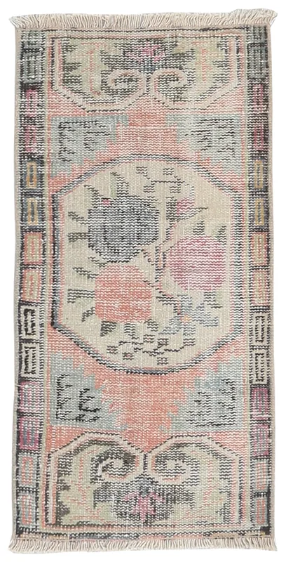 Full top view of the 1'10" x 3'10" vintage Anatolian rug on a white background.