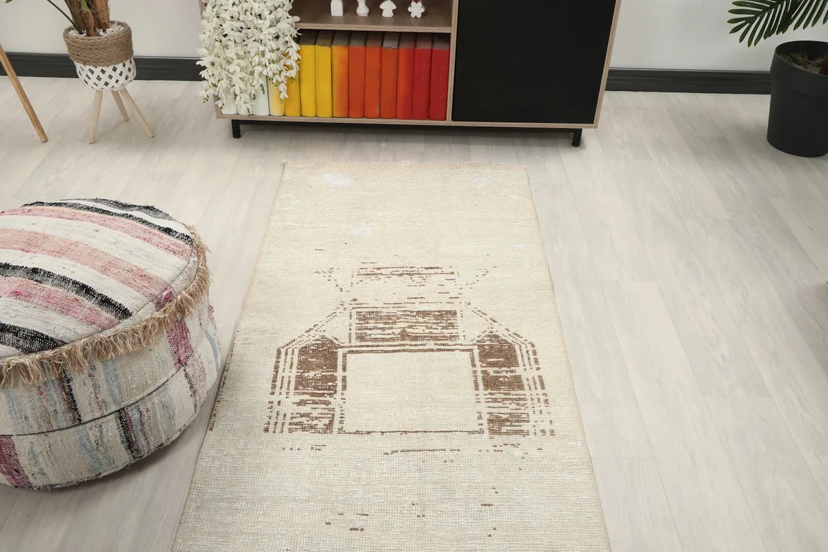 Overhead view of a section of the runner rug in a room with furniture