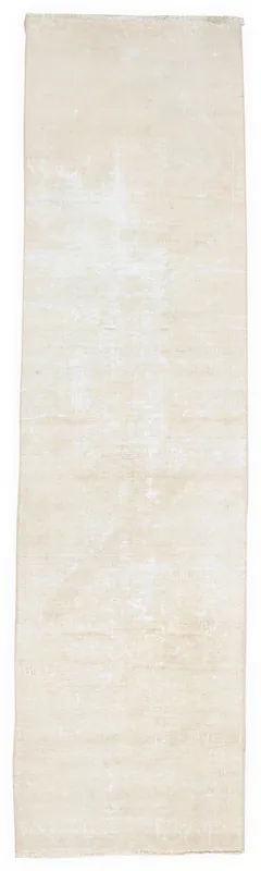 Full overhead view of the 2'9" x 10'6" beige vintage Anatolian runner rug on a white background.