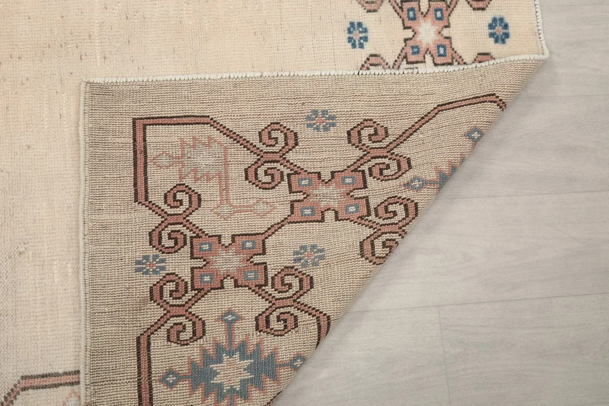 Detail of the rug's back, showing the consistent hand-knotted wool on cotton foundation