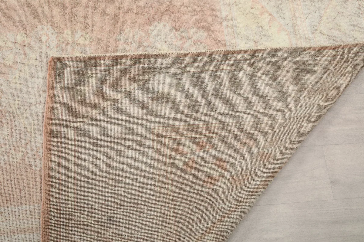 Detail of the reverse side of the rug, illustrating the intricate hand-knotting craftsmanship.