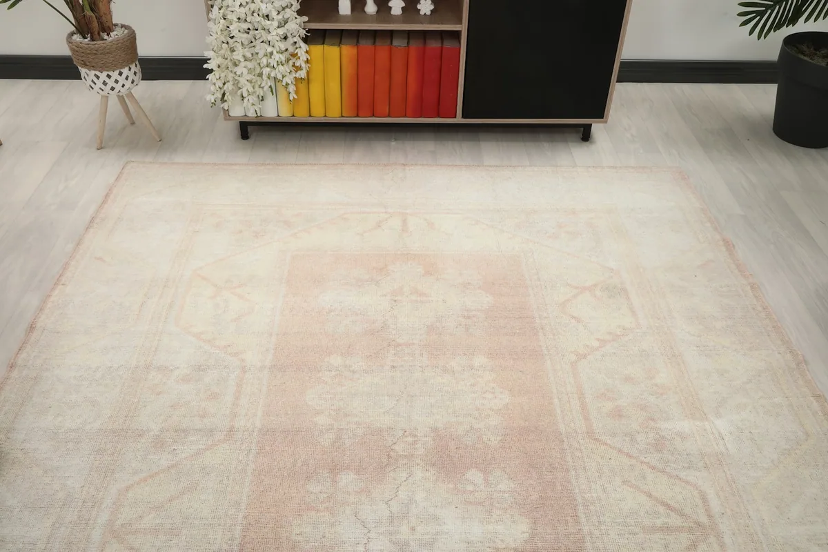 Overhead view of the vintage Anatolian rug in a room setting, showing its overall placement.