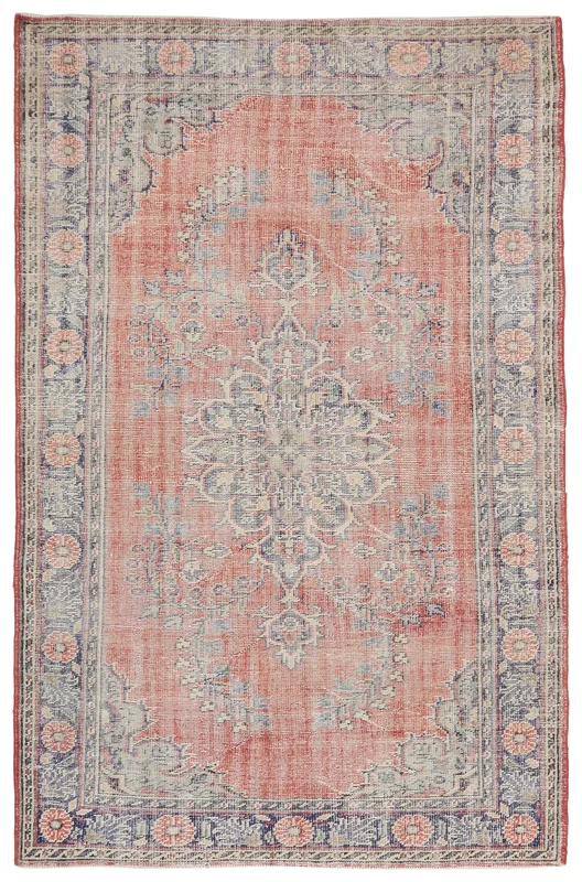 Full overhead view of the rust floral medallion vintage Anatolian rug