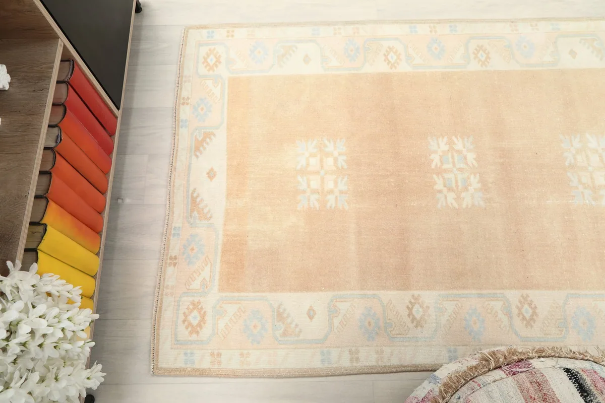 Overhead view of the rug, showing its full design and colors from a higher perspective