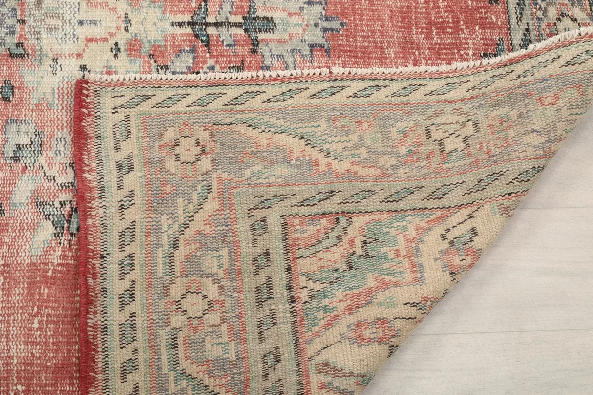 Another folded corner view, showing the tightly woven cotton foundation and craftsmanship