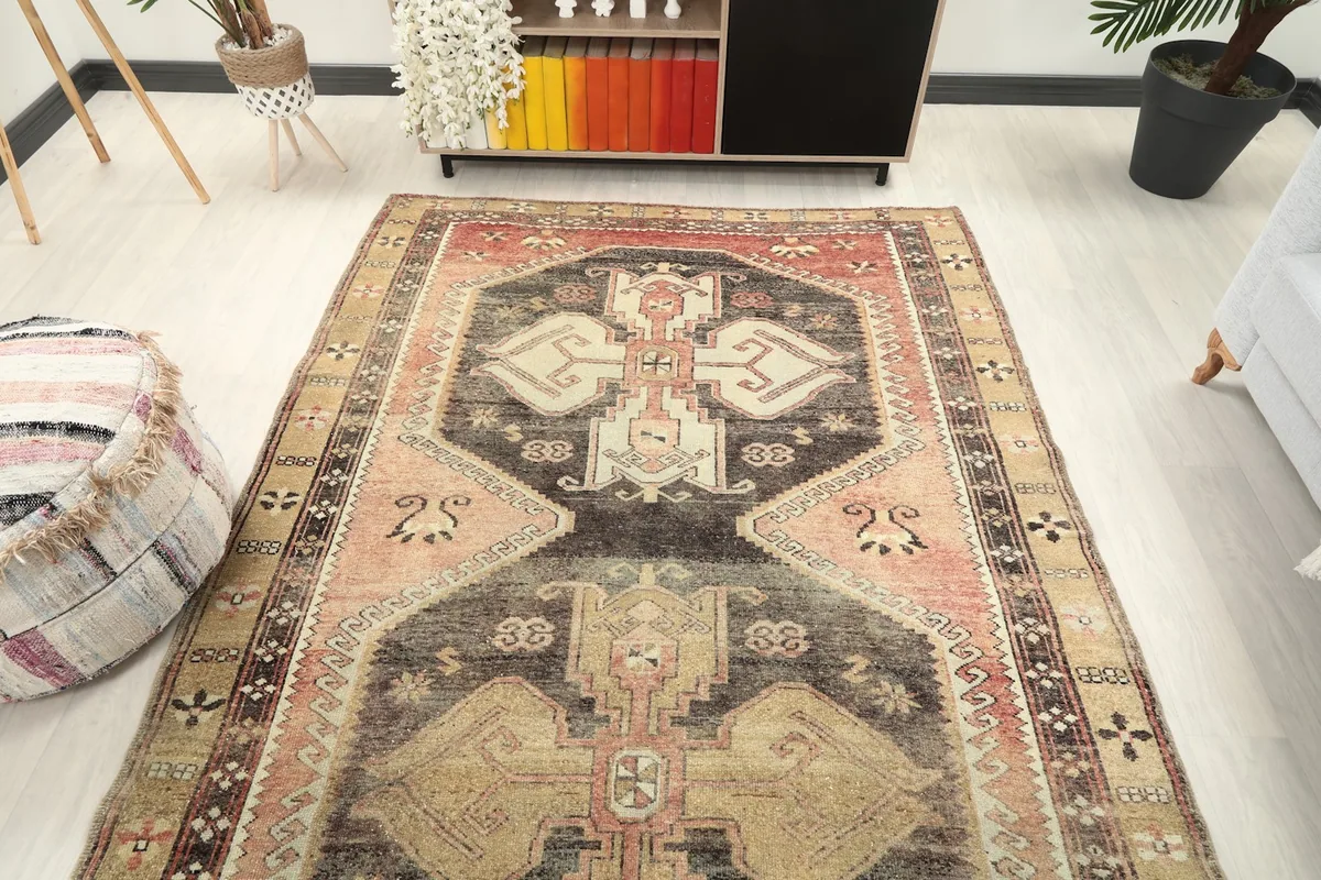 Overhead view of the rug in a room, highlighting its full design and proportion