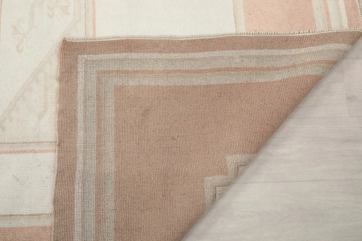 Underside of the rug, showing the dense hand-knotted construction