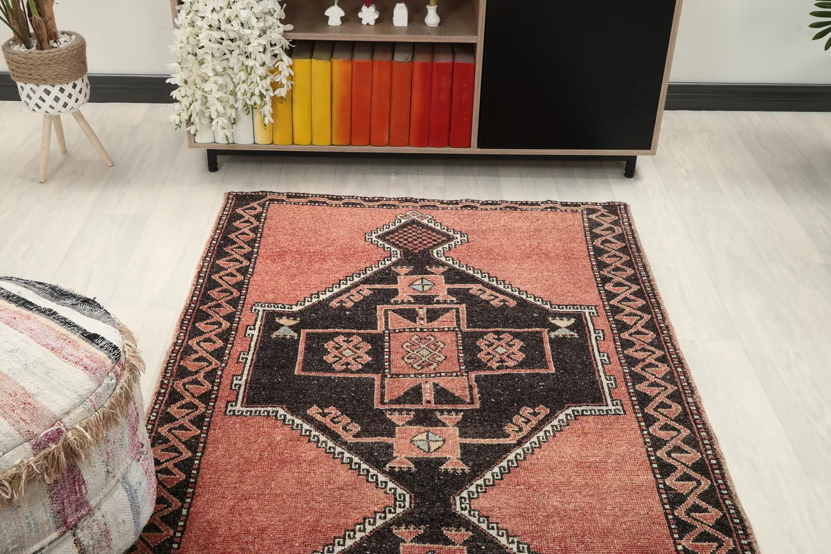 Rust Geometric Anatolian Runner in a room, showing its placement relative to furniture.