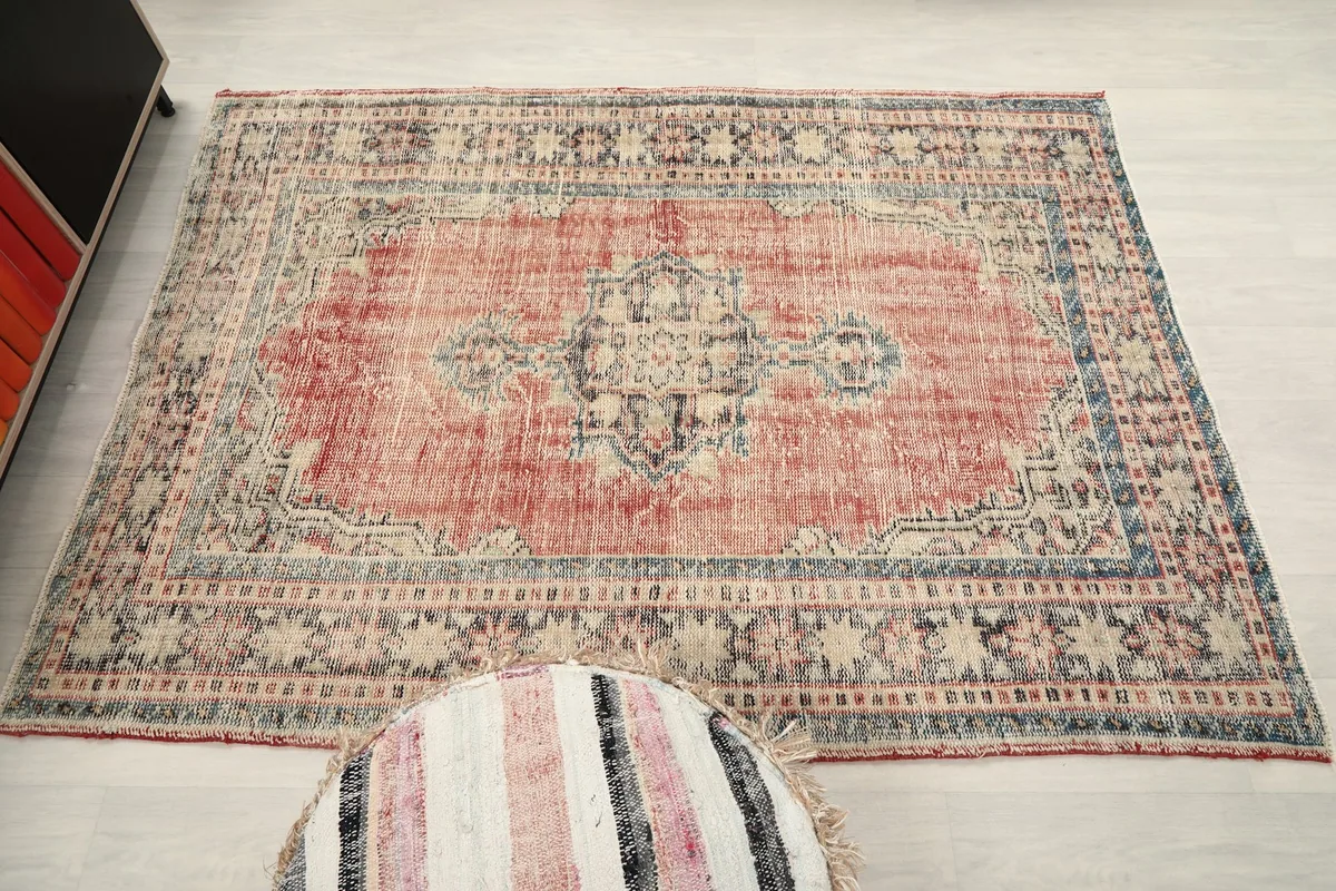 Full overhead view of the rug on a light floor, showcasing its rectangular shape and design