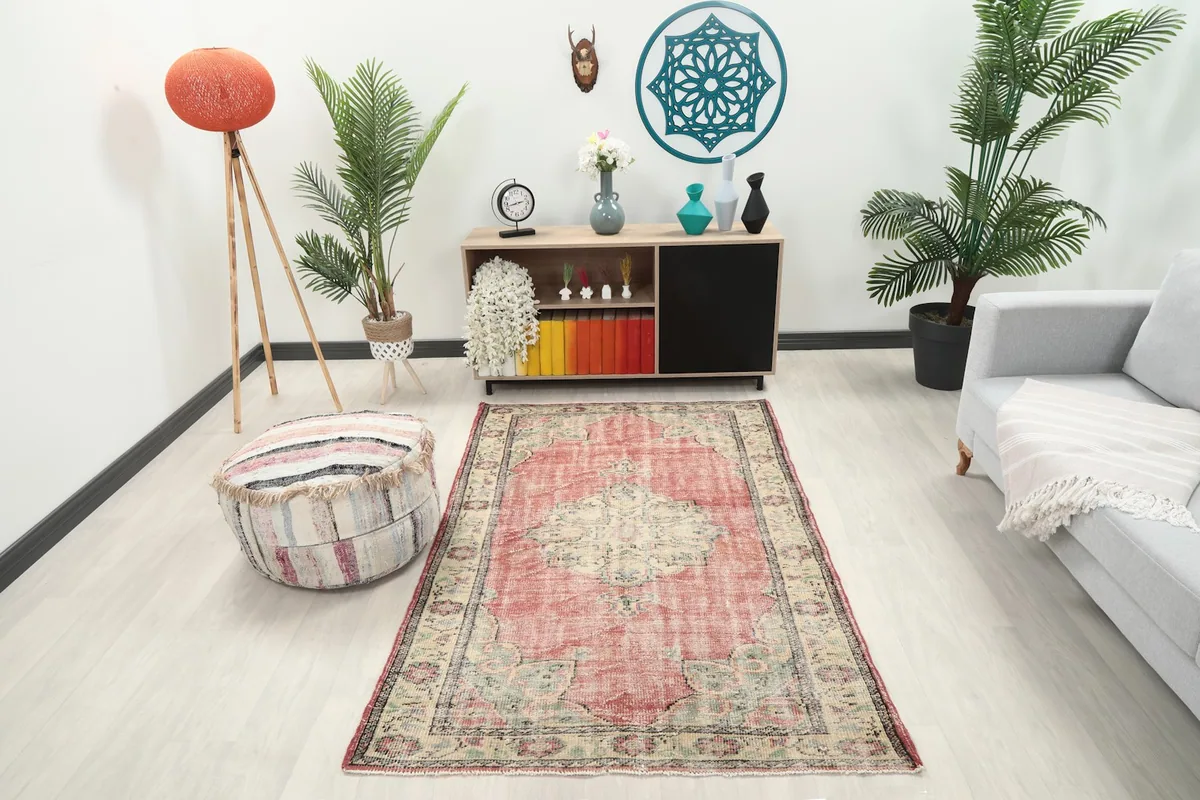 Vintage Anatolian rug in a modern room setting, showing its scale relative to furniture