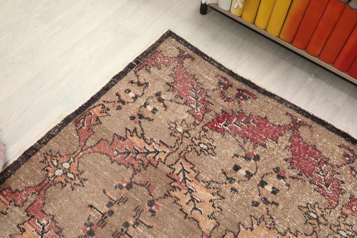 Corner view of the rug, highlighting the pattern and color variations