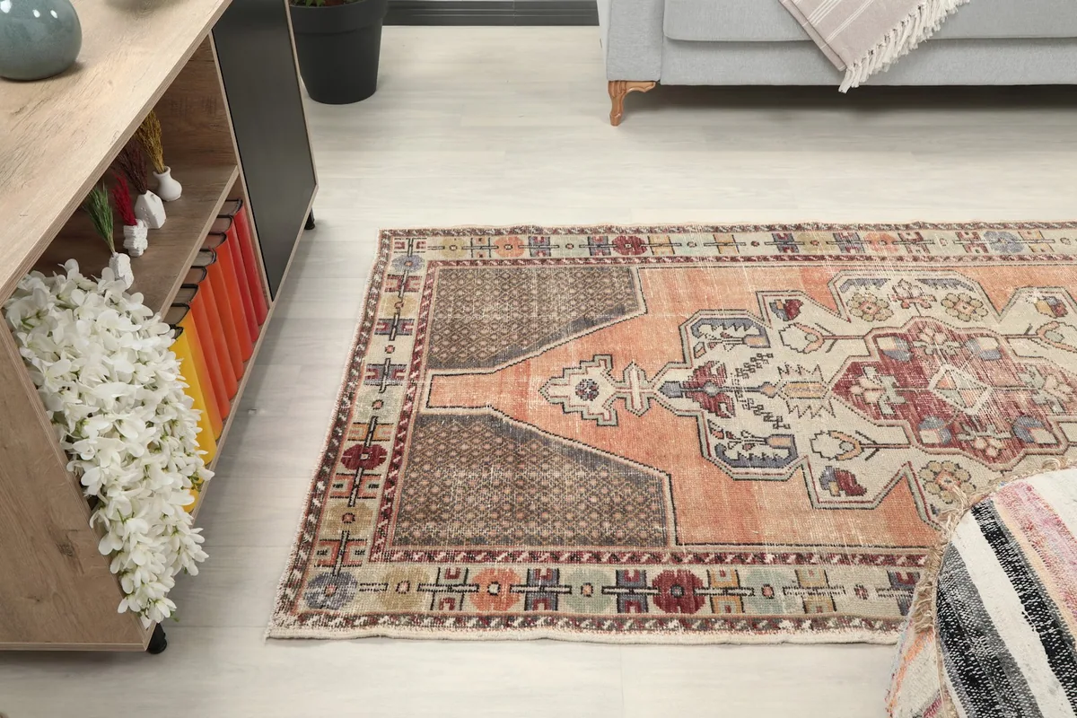 Side view of the rug in the room, showing its length and proportion with furniture