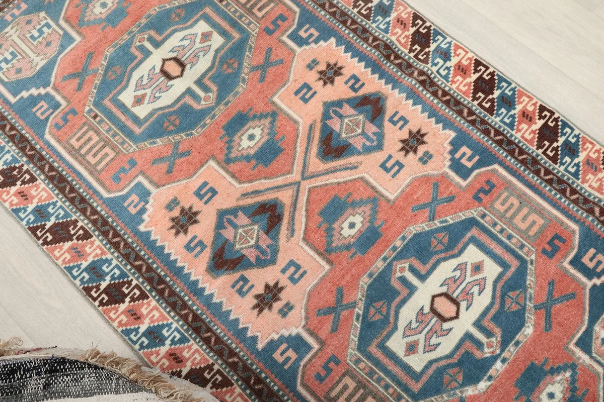 Overhead angle of the rug's center, displaying the intricate geometric design