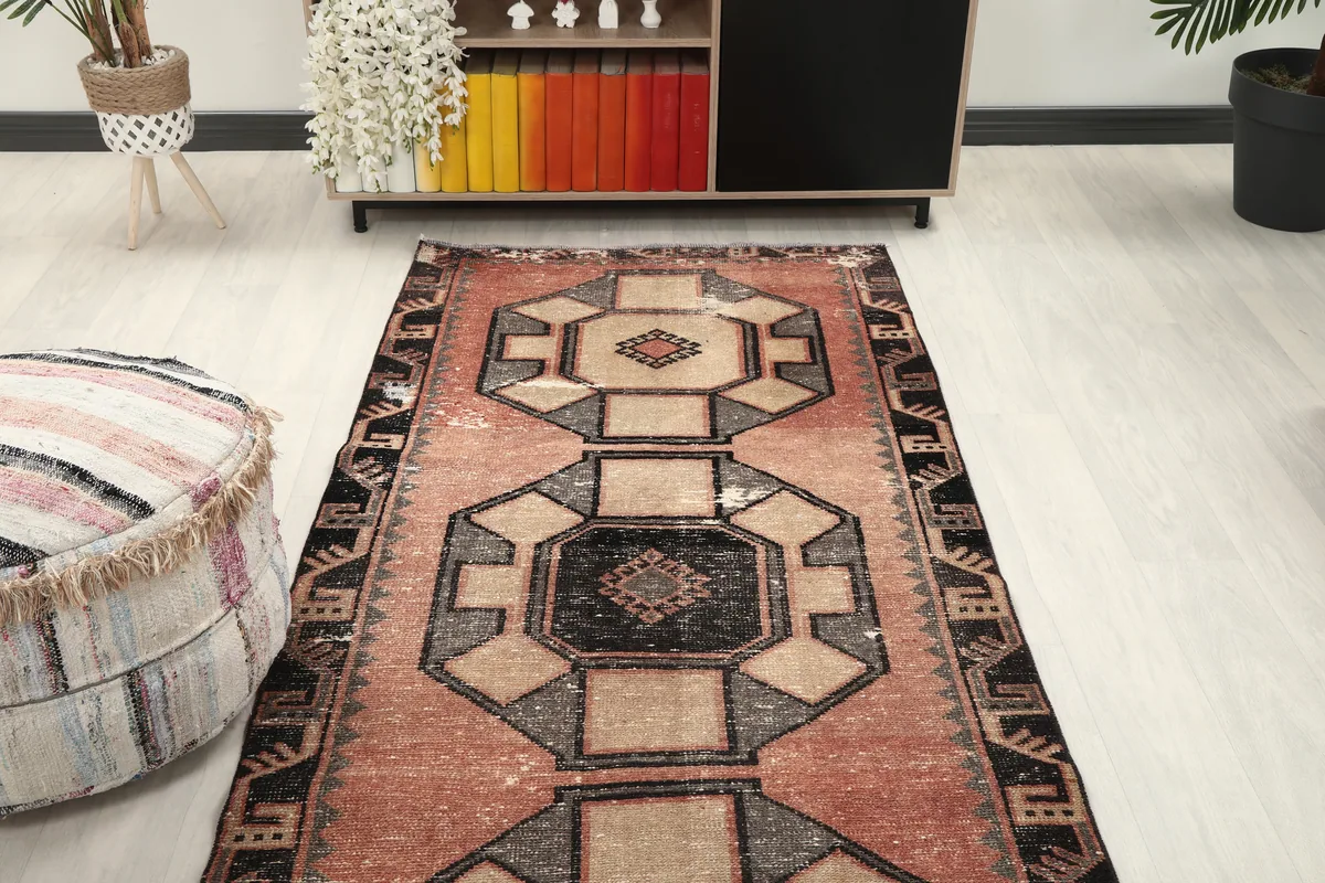 Overhead angle view of the Rust Octagonal Medallion Runner in a room
