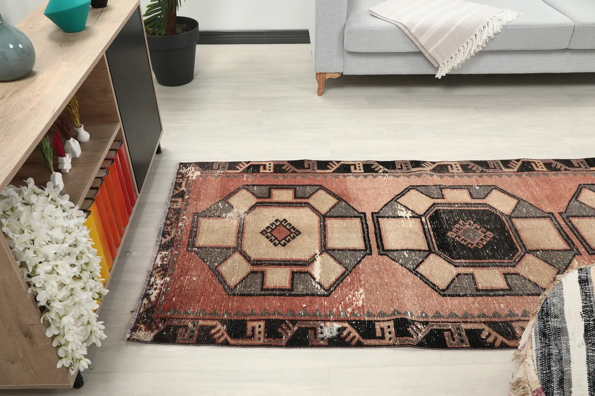 Rust Octagonal Medallion Runner in a room, highlighting its length and design