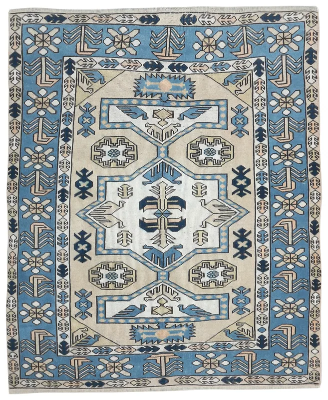 Full top view of the 5x6 vintage Anatolian rug with blue and beige geometric patterns