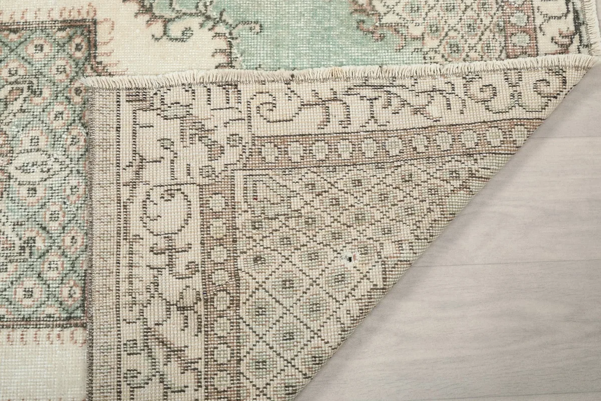 Close-up of the back of the rug, revealing the tight knotting and craftsmanship