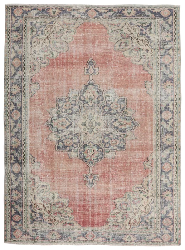 Full top view of the 6'11" x 9'8" rose and navy medallion vintage Anatolian rug