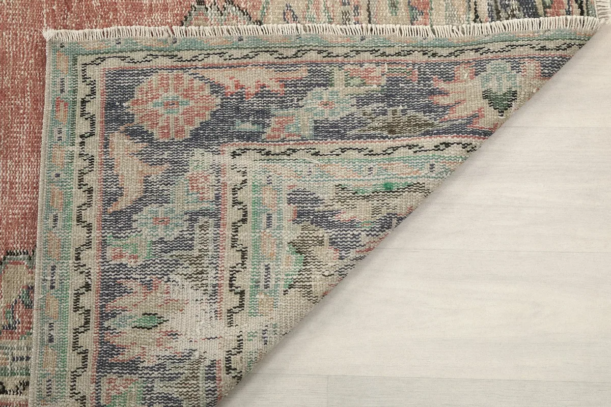 Underside view of the hand-knotted wool pile on cotton foundation