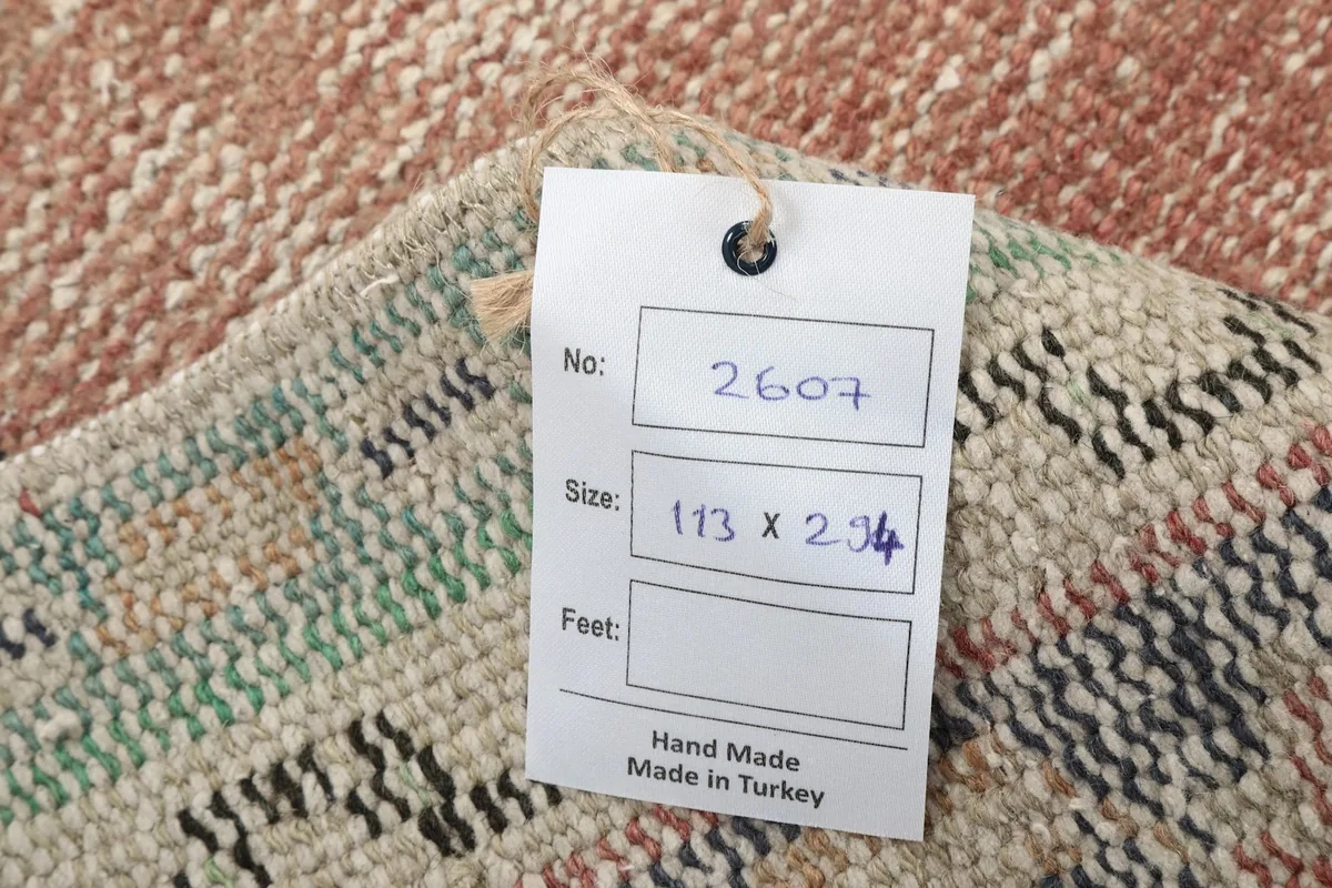 Tag showing the rug's unique number and country of origin, Made in Turkey