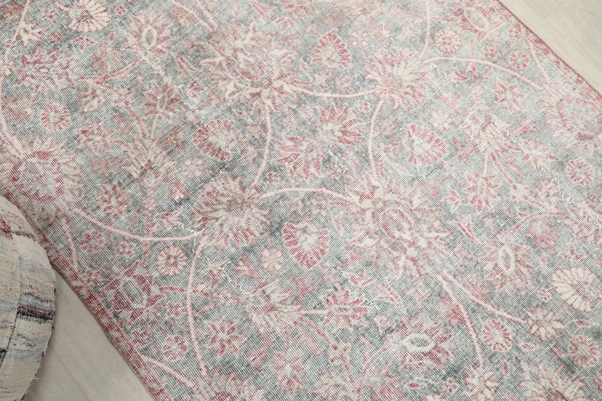 Overhead angle capturing the full design and colors of the vintage wool rug