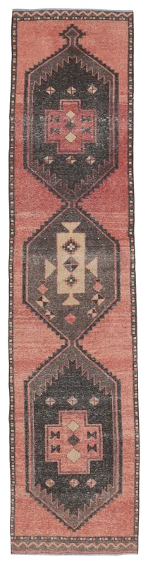 Full top view of the 2'9" x 12'2" vintage Anatolian runner rug with rust and charcoal geometric patterns.