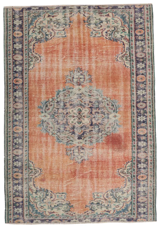 Full overhead view of the rust and navy medallion vintage Anatolian rug