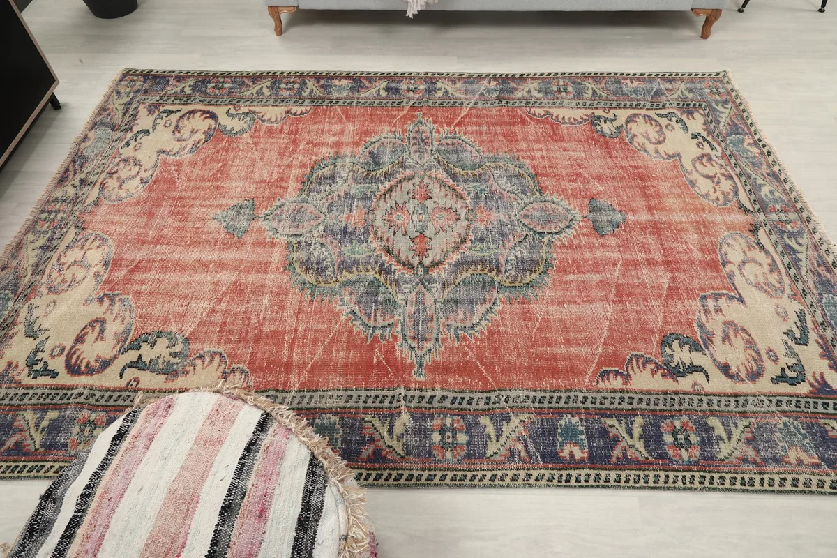 Wide view of the vintage Anatolian rug in a staged living room