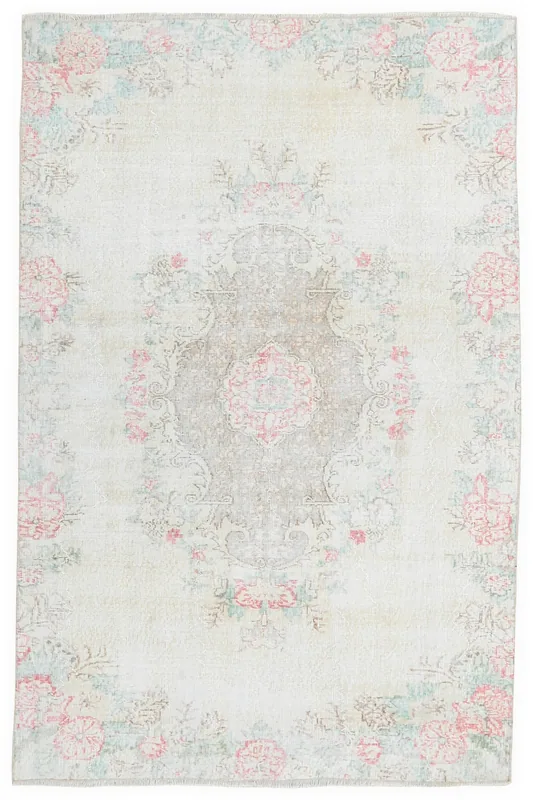 Full overhead view of the vintage Anatolian rug with ivory field and rose floral motifs