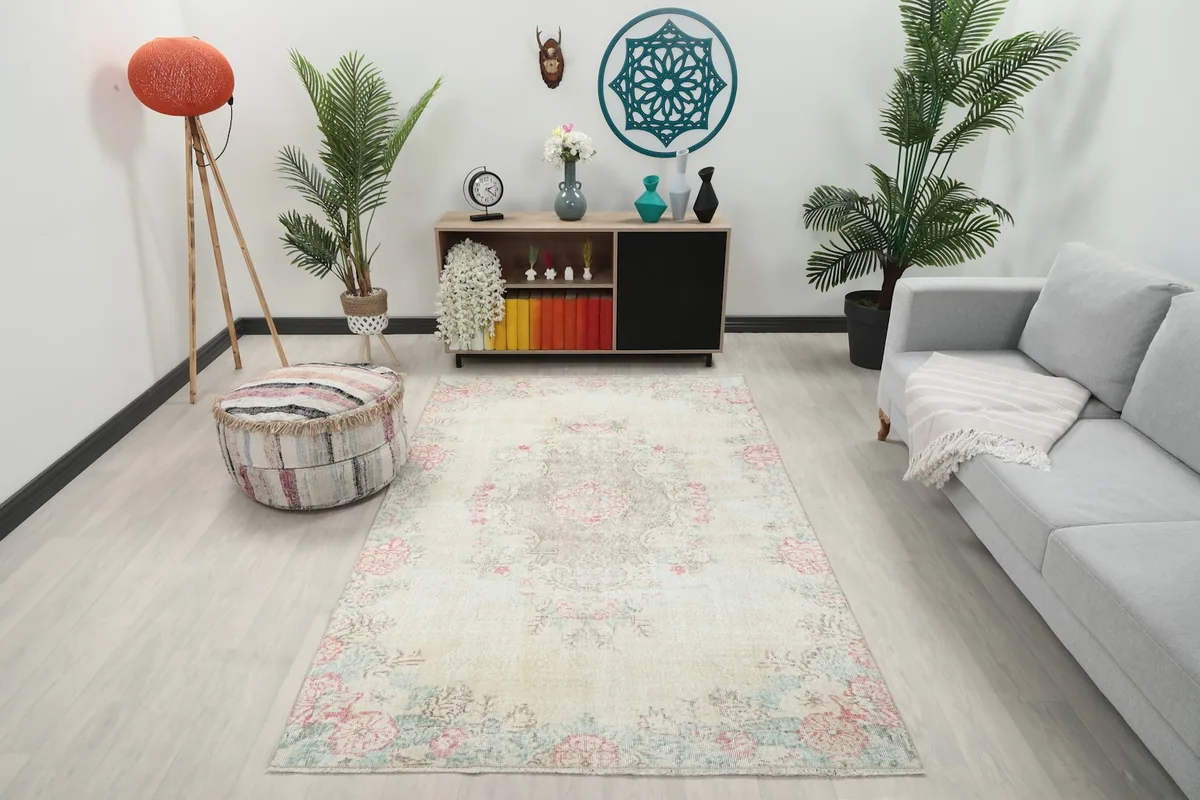 Area rug shown in a living room setting, viewed from a wide angle