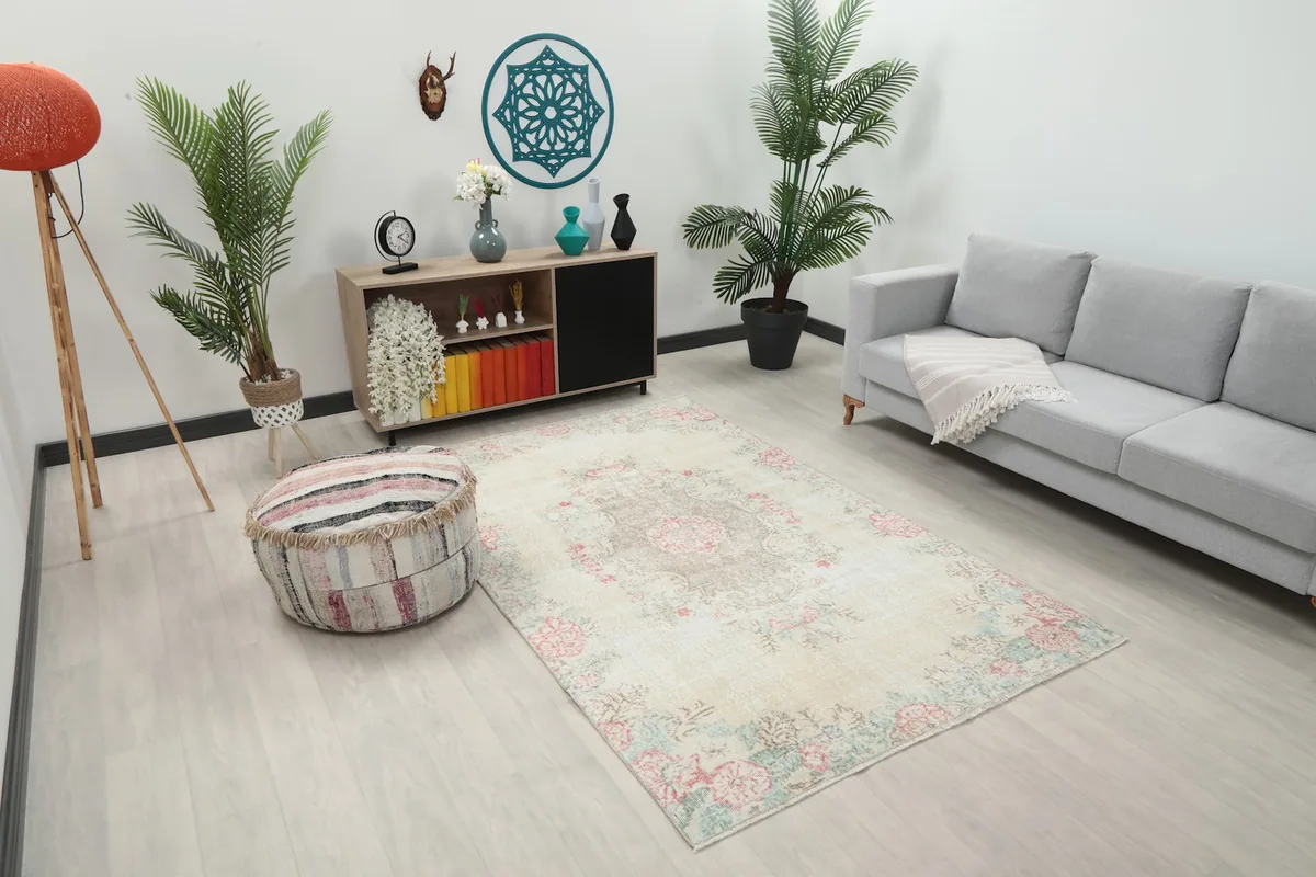 Area rug displayed in a living room setting, showing its placement relative to furniture