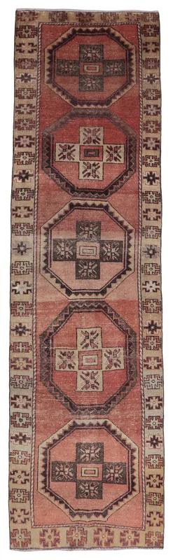 Full top view of the 3'6" x 13'1" vintage Anatolian runner rug with octagonal motifs