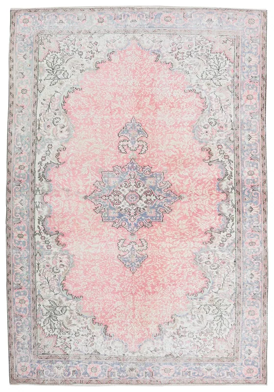 Full overhead view of the 6'8" x 9'10" vintage Anatolian area rug with a rose field and blue medallion