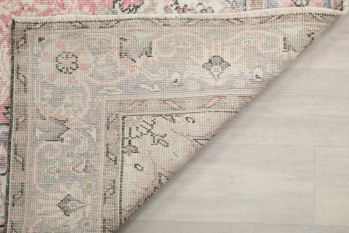 Close-up of the back of the rug, revealing the detailed knotting and craftsmanship