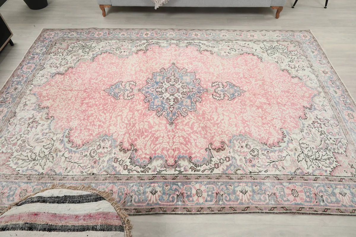 Full overhead view of the rug, emphasizing the overall design and color balance in the room