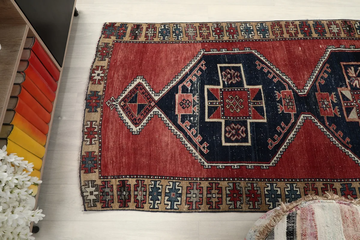 Angled shot of the runner rug from above, showing its full length and pattern
