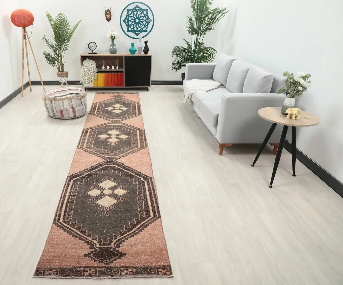Runner rug in a modern living room setting, viewed from an angle