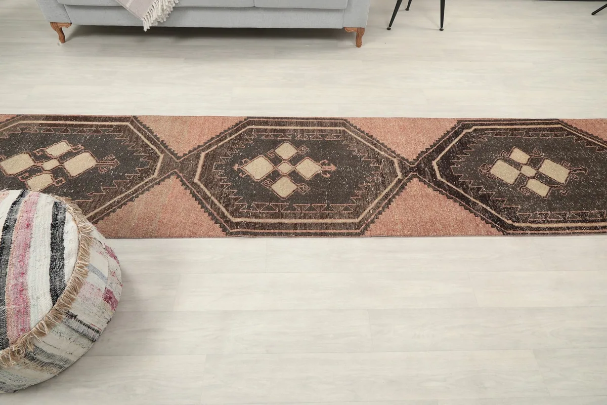 Overhead view of the runner rug in a room, showcasing its elongated shape and pattern