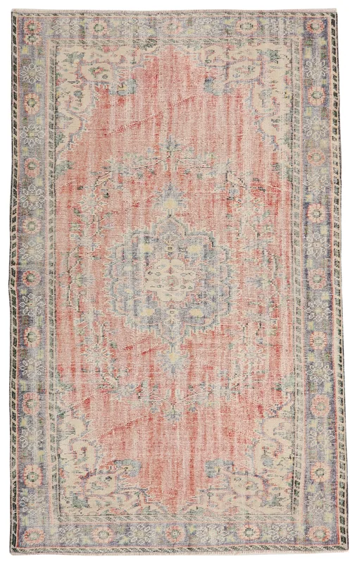Full top view of a vintage hand-knotted Anatolian area rug with a rose field and central blue medallion