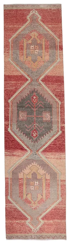 Full top view of the vintage Anatolian runner rug with rust field and gray geometric medallions