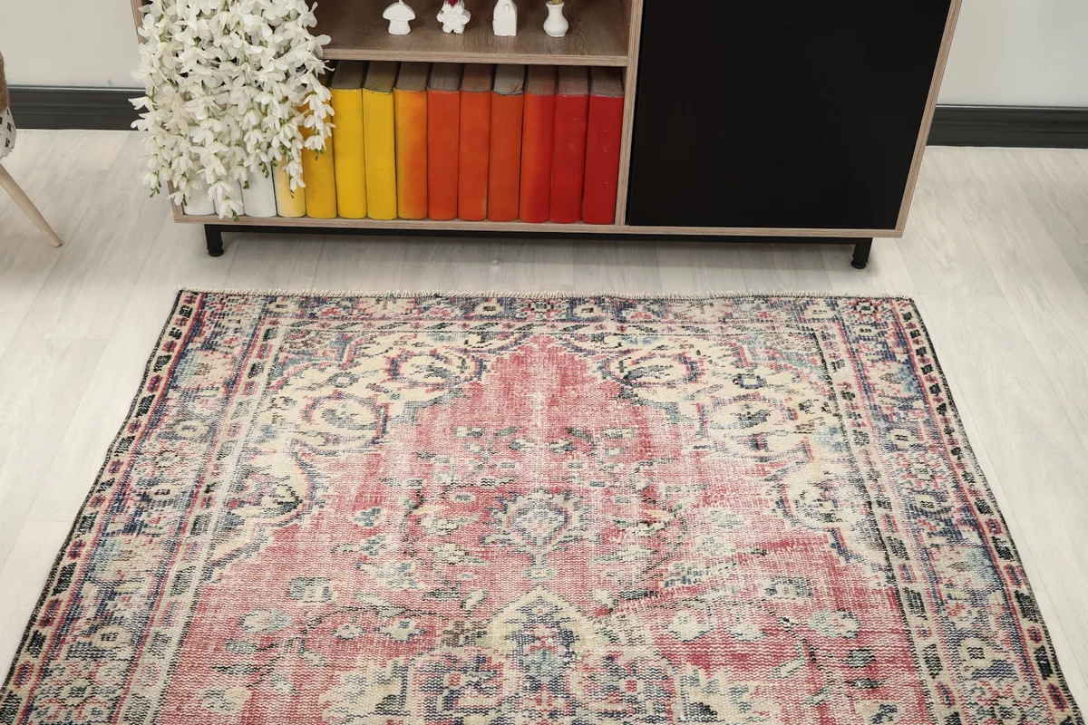 Overhead view of the rug in a living room, showing its full length and width