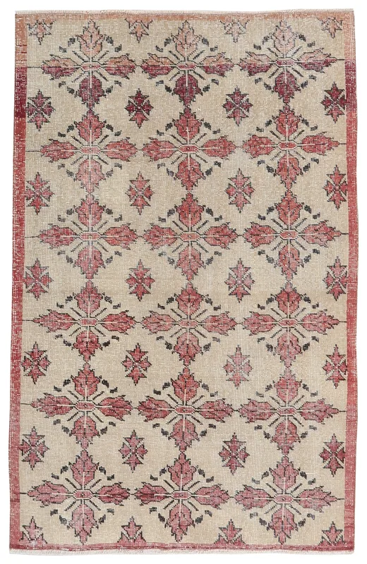 Full top view of the 4'3" x 6'6" beige and rose vintage Anatolian rug