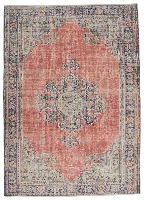 Full top view of the 6'10" x 9'7" vintage Anatolian area rug with a rose field and navy medallion on a white background