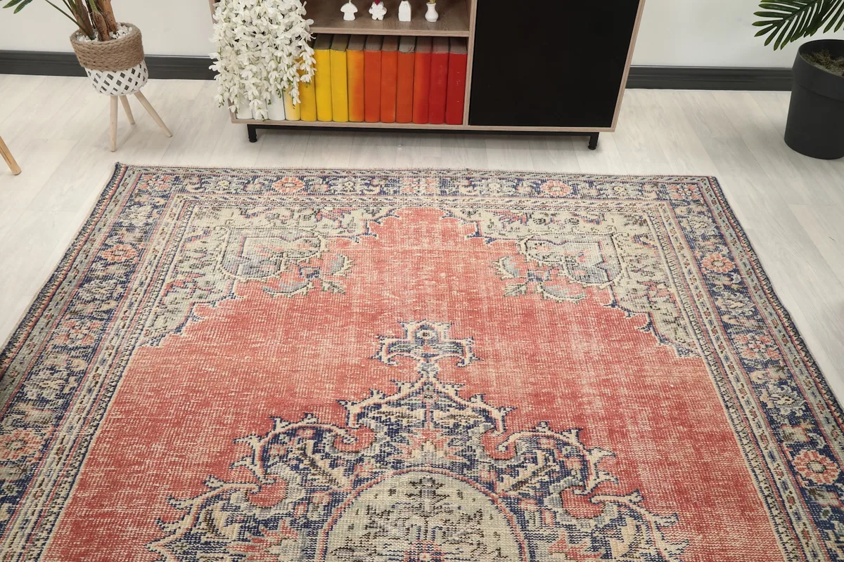 Overhead view of the rug in a room setting, showing its overall pattern and scale within the space