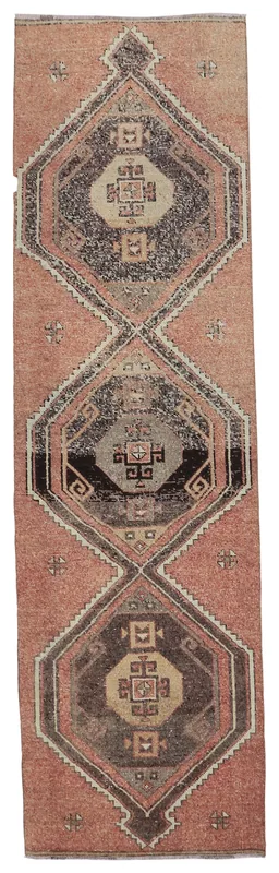 Full top view of the 2'11" x 10'7" rust and charcoal vintage Anatolian runner rug on a white background.