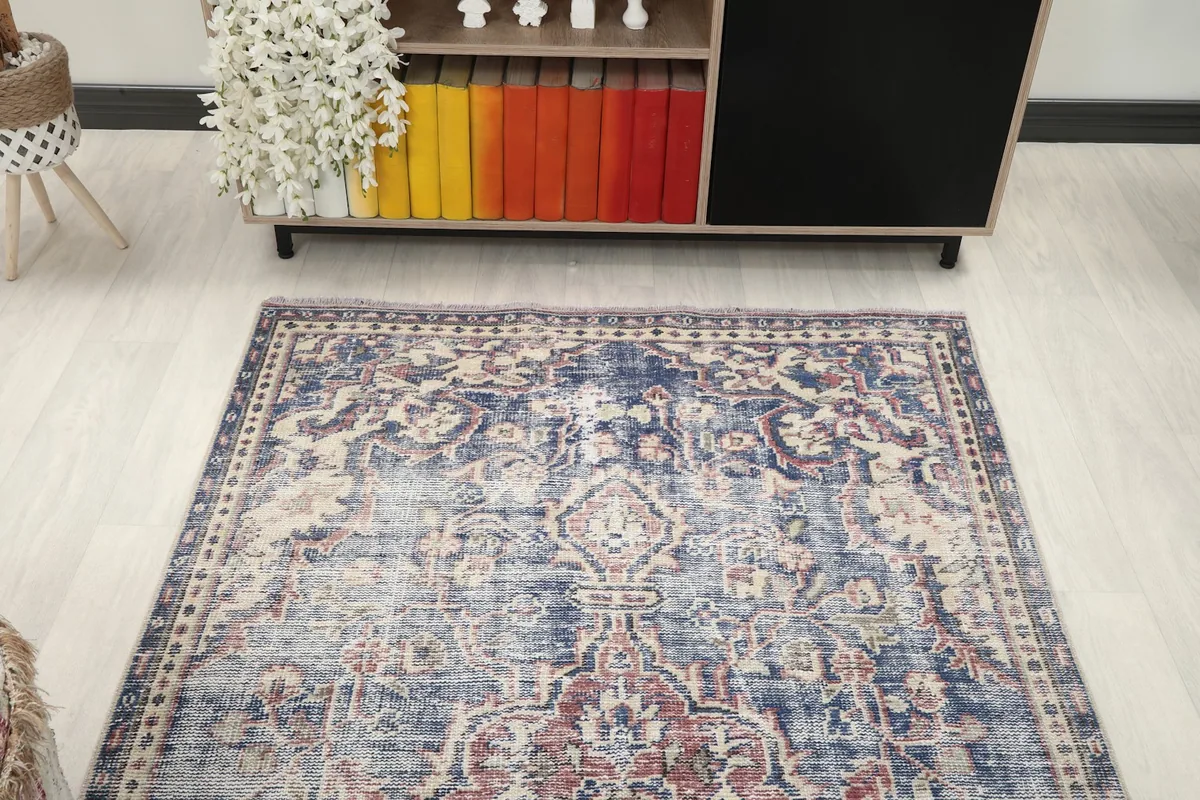 Overhead view of the indigo rug in a room, showing its placement relative to furniture