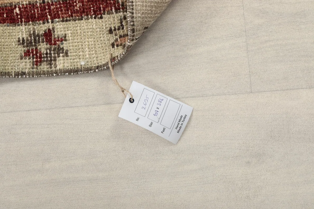 Close-up of the product tag, indicating the rug's origin and material.